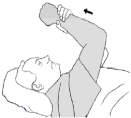 Lying on the back, helping the operated arm upwards with the other arm.